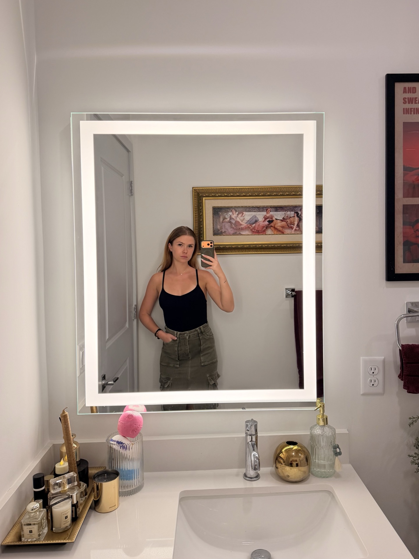 Arina in the bathroom mirror with the LED vanity light